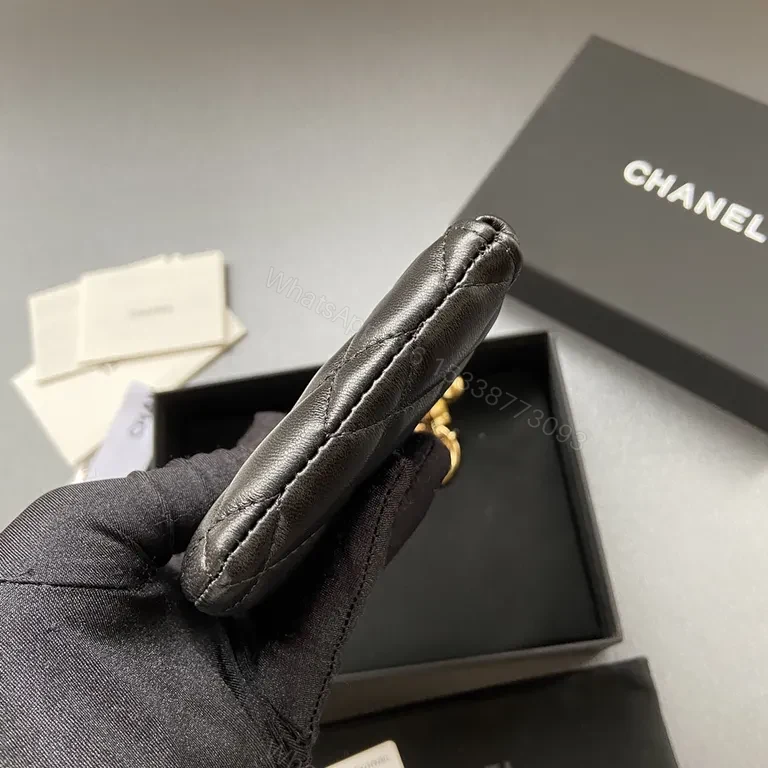 View 2 of Compact Black Quilted Wallet with Gold Chanel Charm â€“ Everyday Luxury