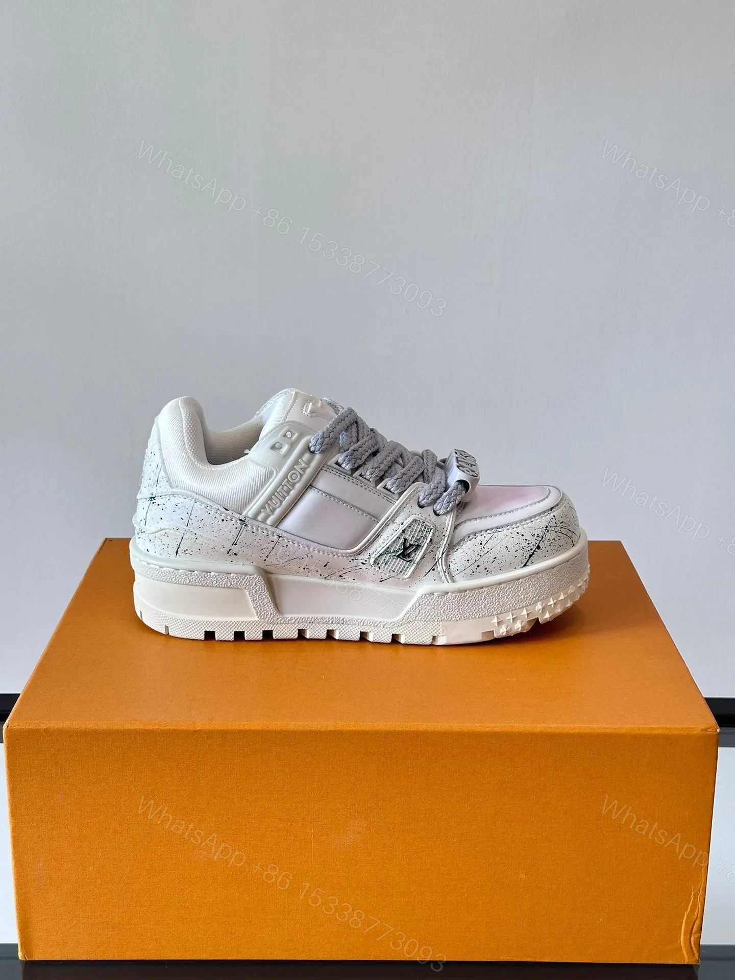 View 6 of LV Men White Leather Sneakers With Black Splatter