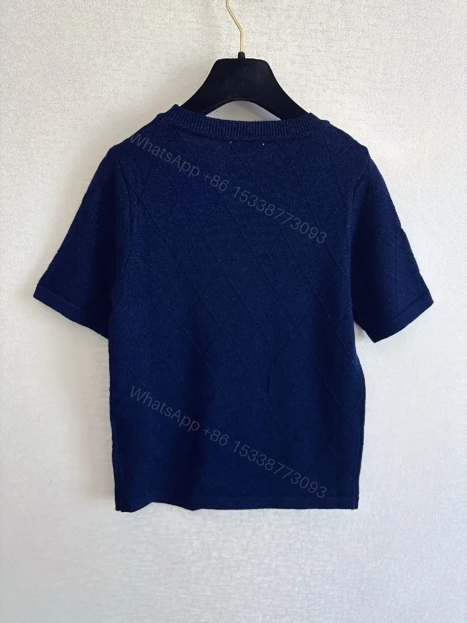 View 4 of Navy Knit Tee with Quilted Texture and Subtle Crest