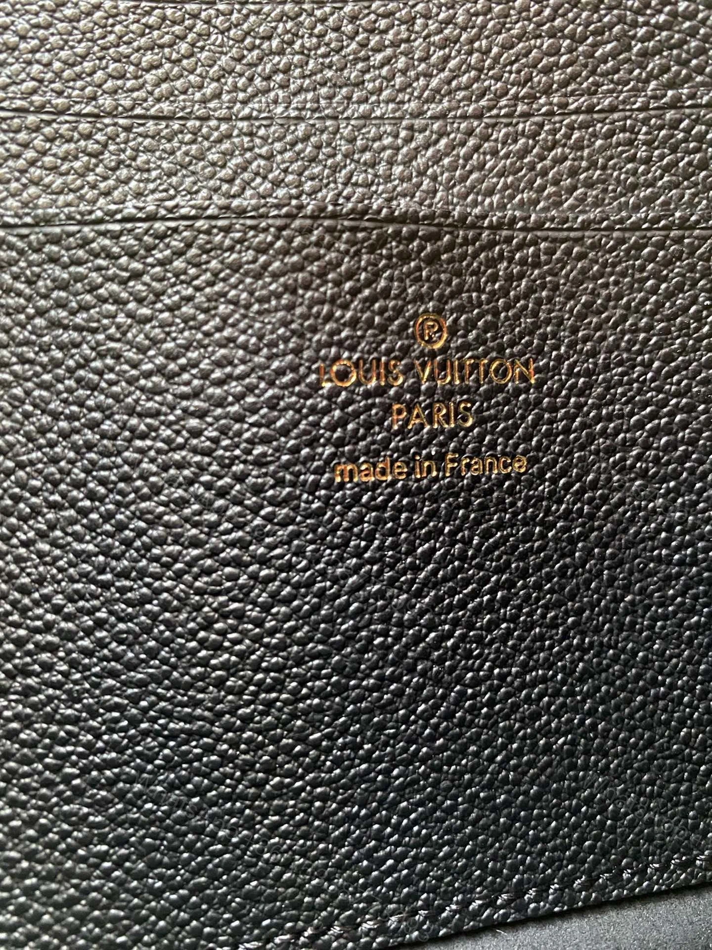 View 2 of Louis Vuitton Empreinte Daily Pouch Black