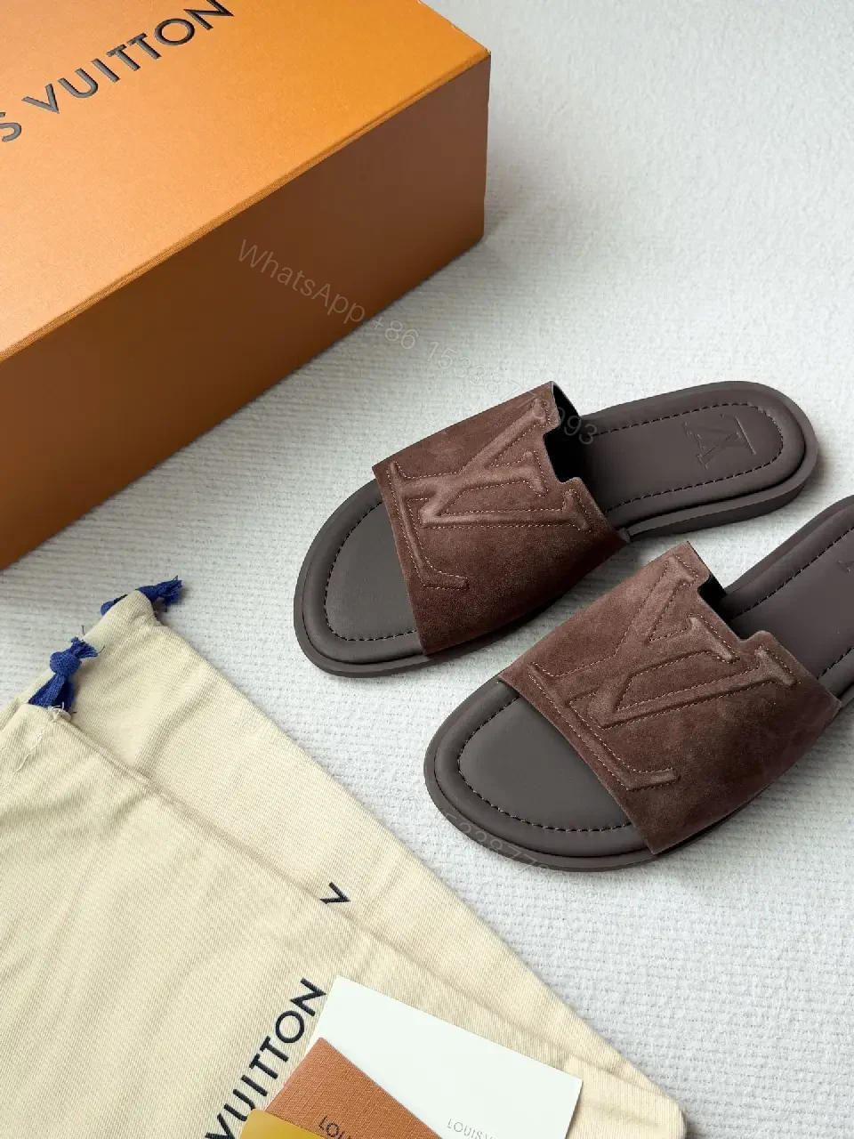 View 8 of Textured Suede Slide with LV Detailing