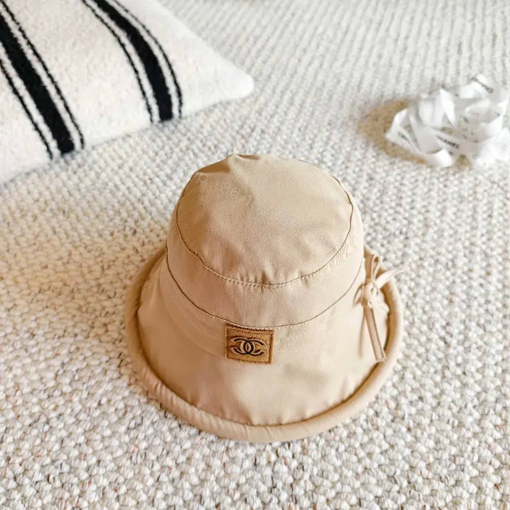 View 10 of Beige Lightweight Bucket Hat with Logo Detail