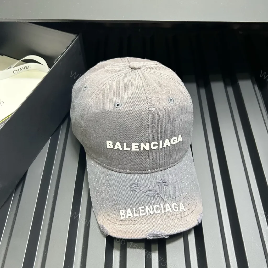 View 5 of Chic Cotton Cap: Minimalist Luxury, Subtle BALENCIAGA Embroidery