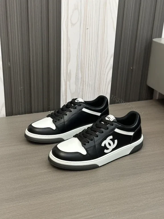 View 8 of Monochrome Chanel-Style Low-Top Sneakers with Signature Emblem