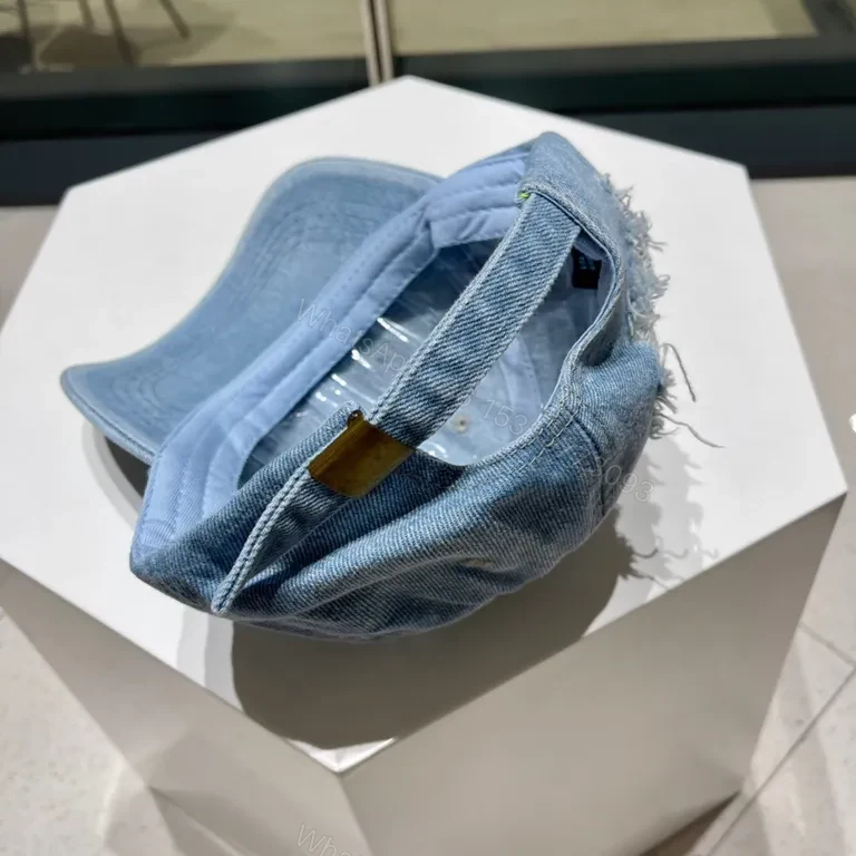 View 4 of Prada Denim Cap: Subtle Luxury Everyday Style