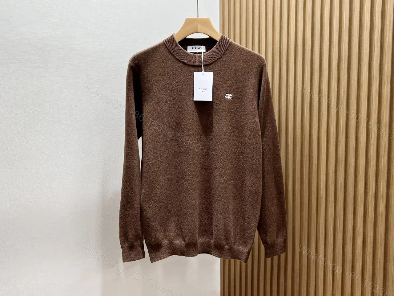 Rich Cocoa Knit Sweater in Marled Texture with Crest Embroidery — view 1