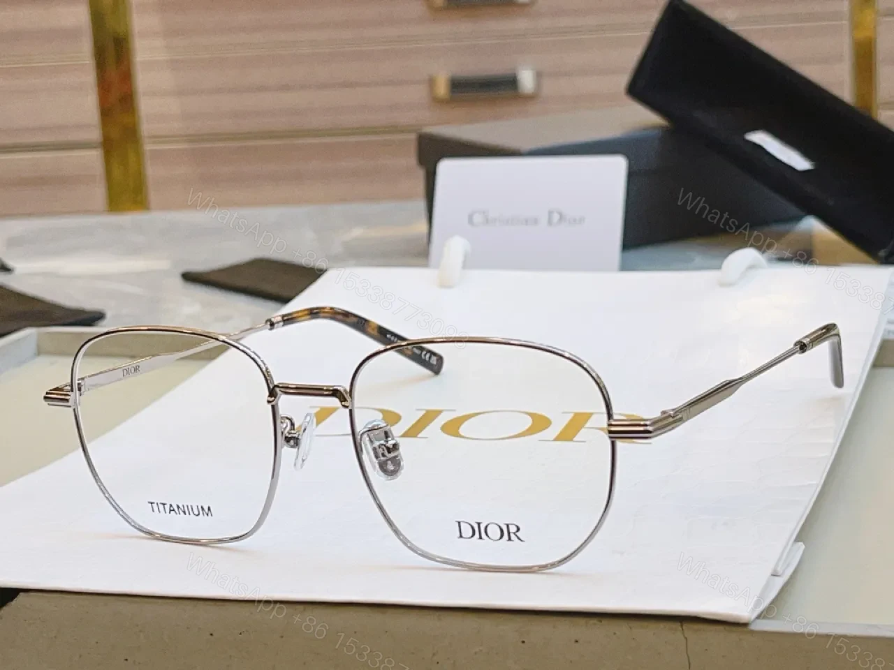View 3 of Elegant Titanium Rim Eyewear: Subtle Designer Accents Suiting Any Look