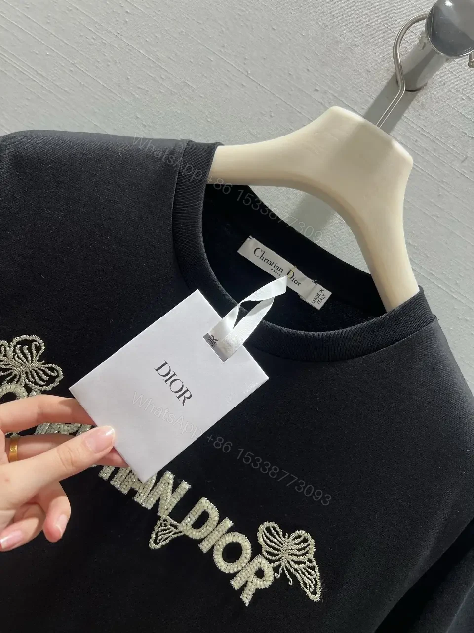 View 3 of Black Cotton Tee with Subtle Embroidered Logo - Luxury Everyday Wear