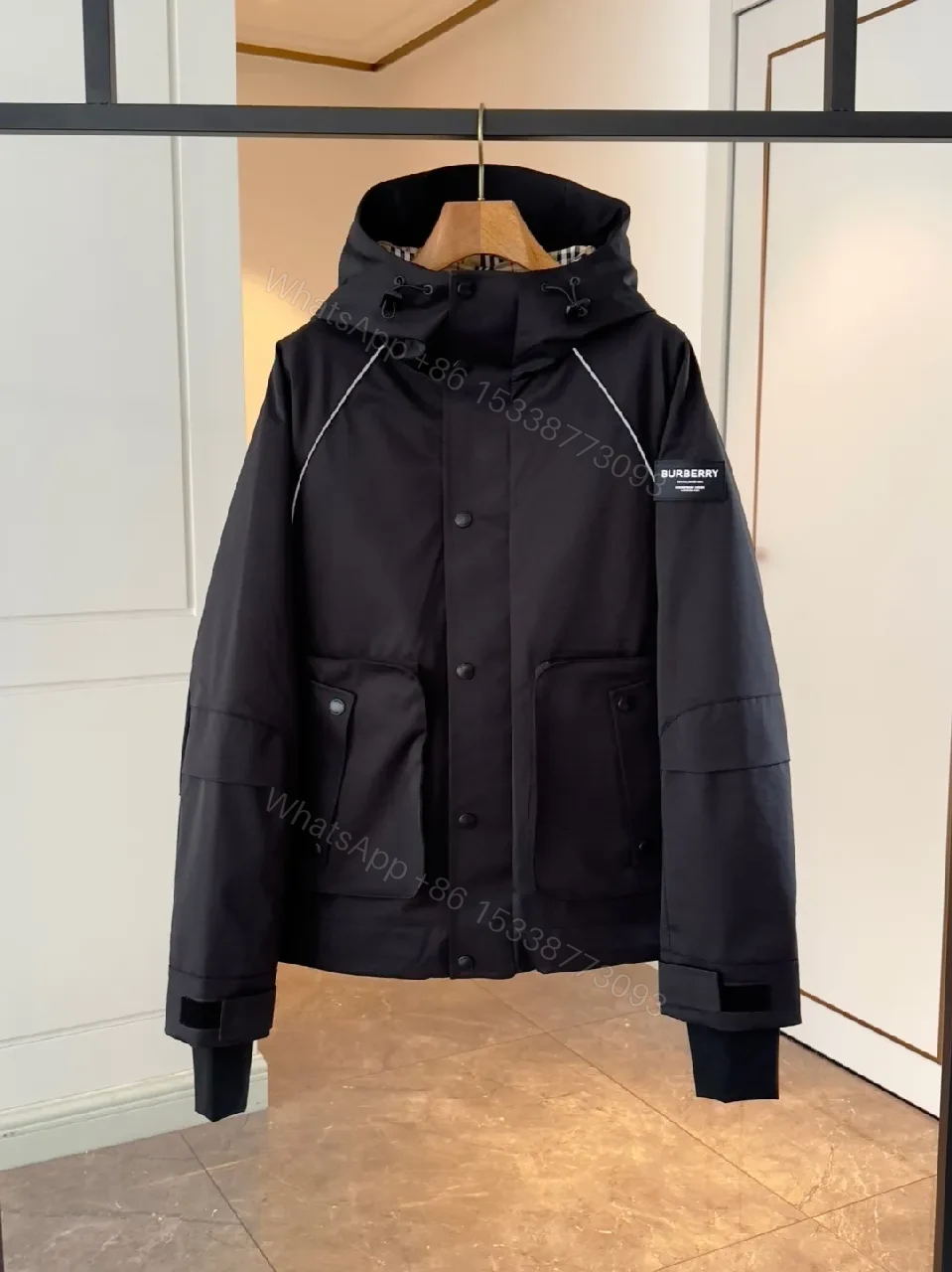 View 3 of Water-Resistant Black Parka with Plaid Lining Luxury-Utility Coat