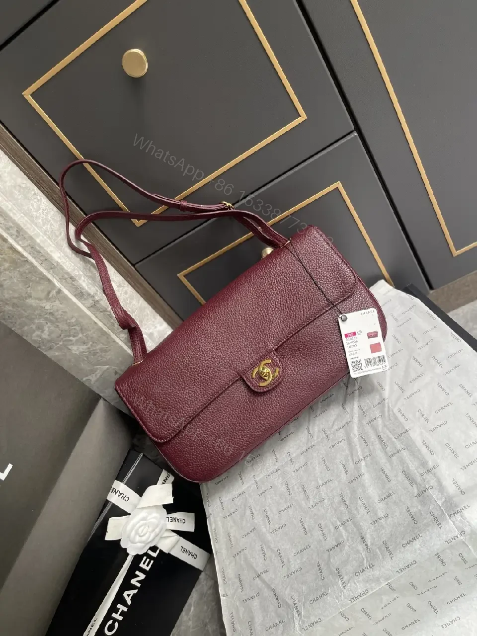 View 3 of Burgundy Textured Leather Shoulder Bag: Compact Luxury