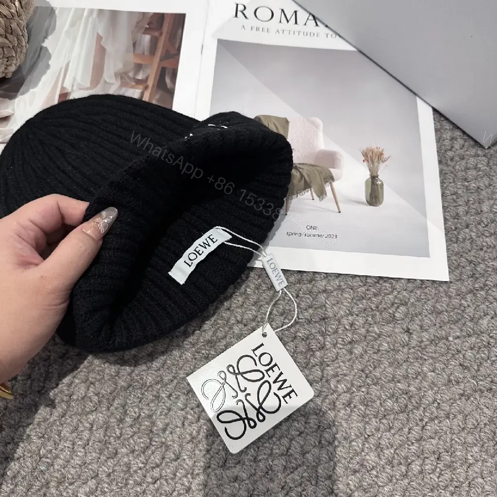 View 8 of Black Knit Beanie + Premium Knit + Chic Minimalist + LOEWE Logo Statement + Beanie
