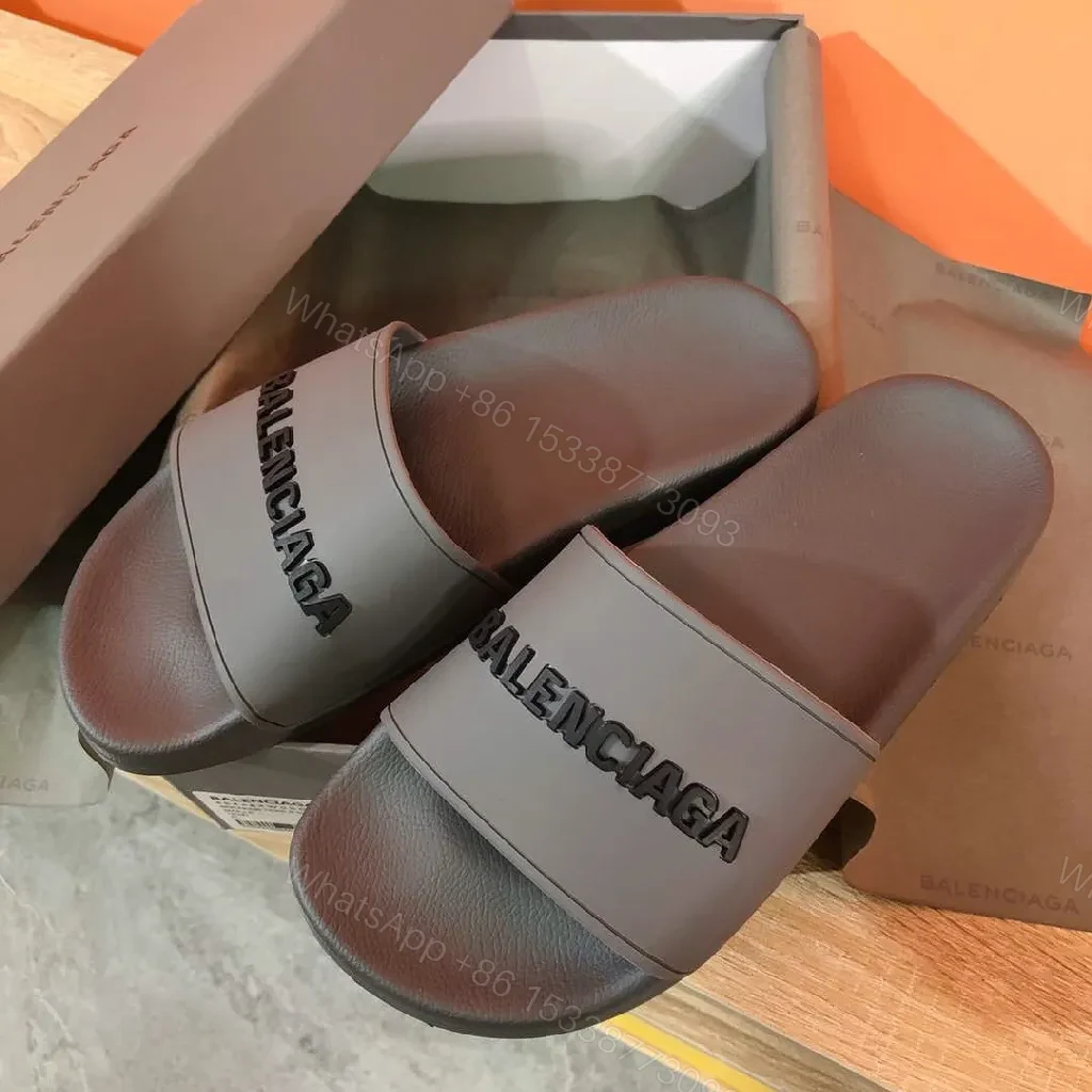 View 3 of Minimalist Designer Slides in Neutral Faux Leather with Bold Logo Strap