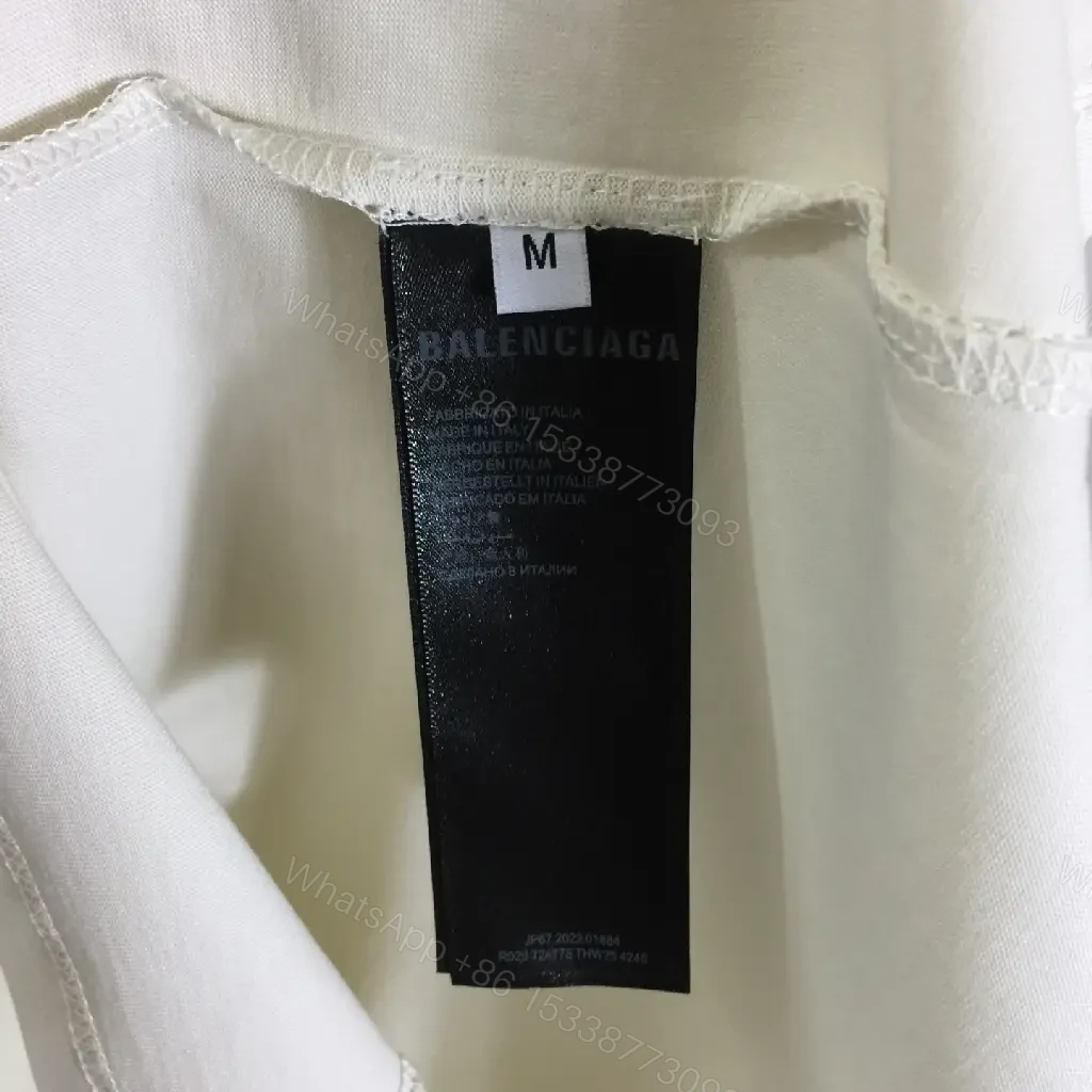 View 7 of Ivory Cotton Oversized Tee – Distressed Logo Streetwear Edge