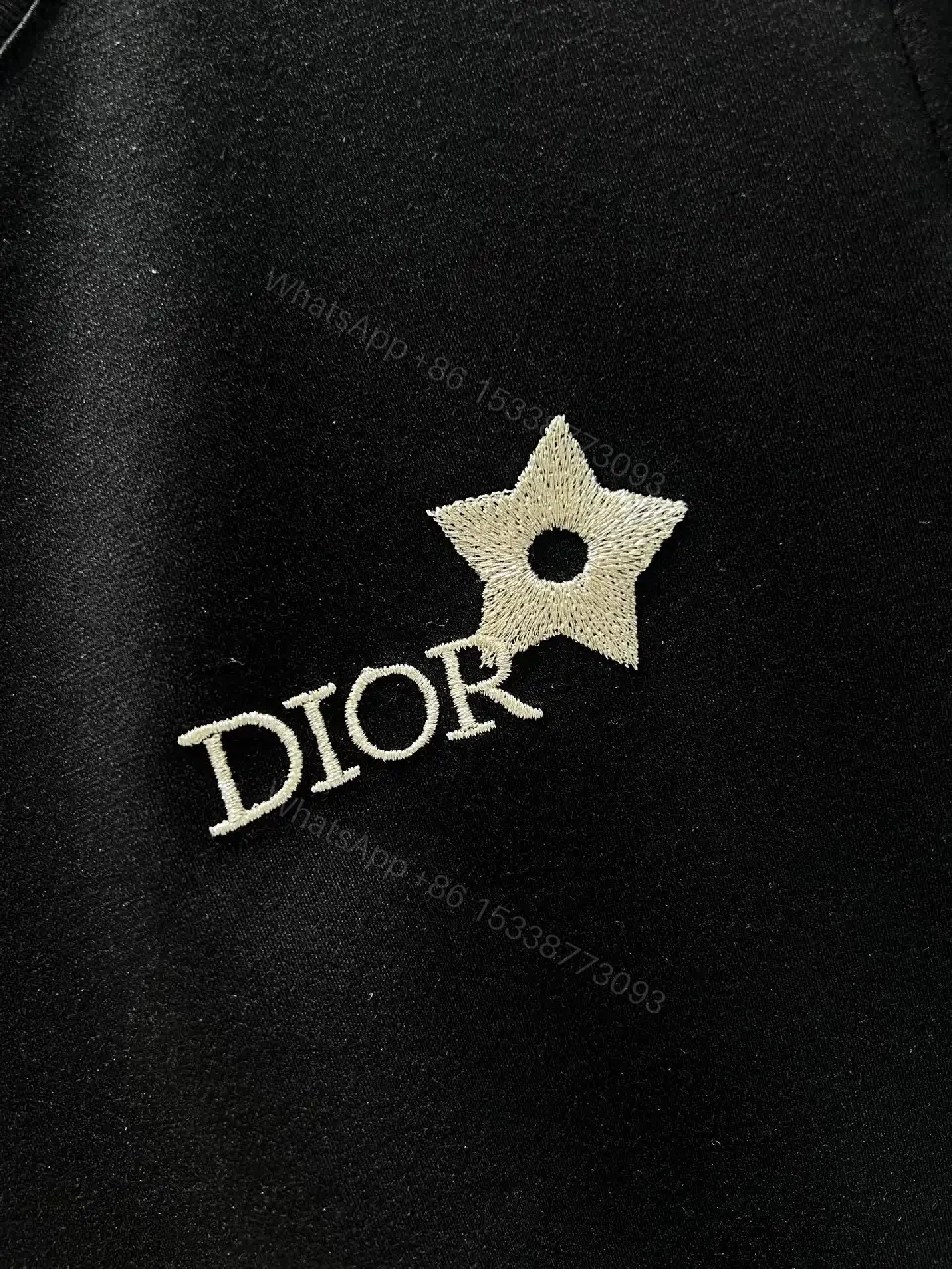 View 3 of Minimalist Black Cotton Tee with Discreet Emblem