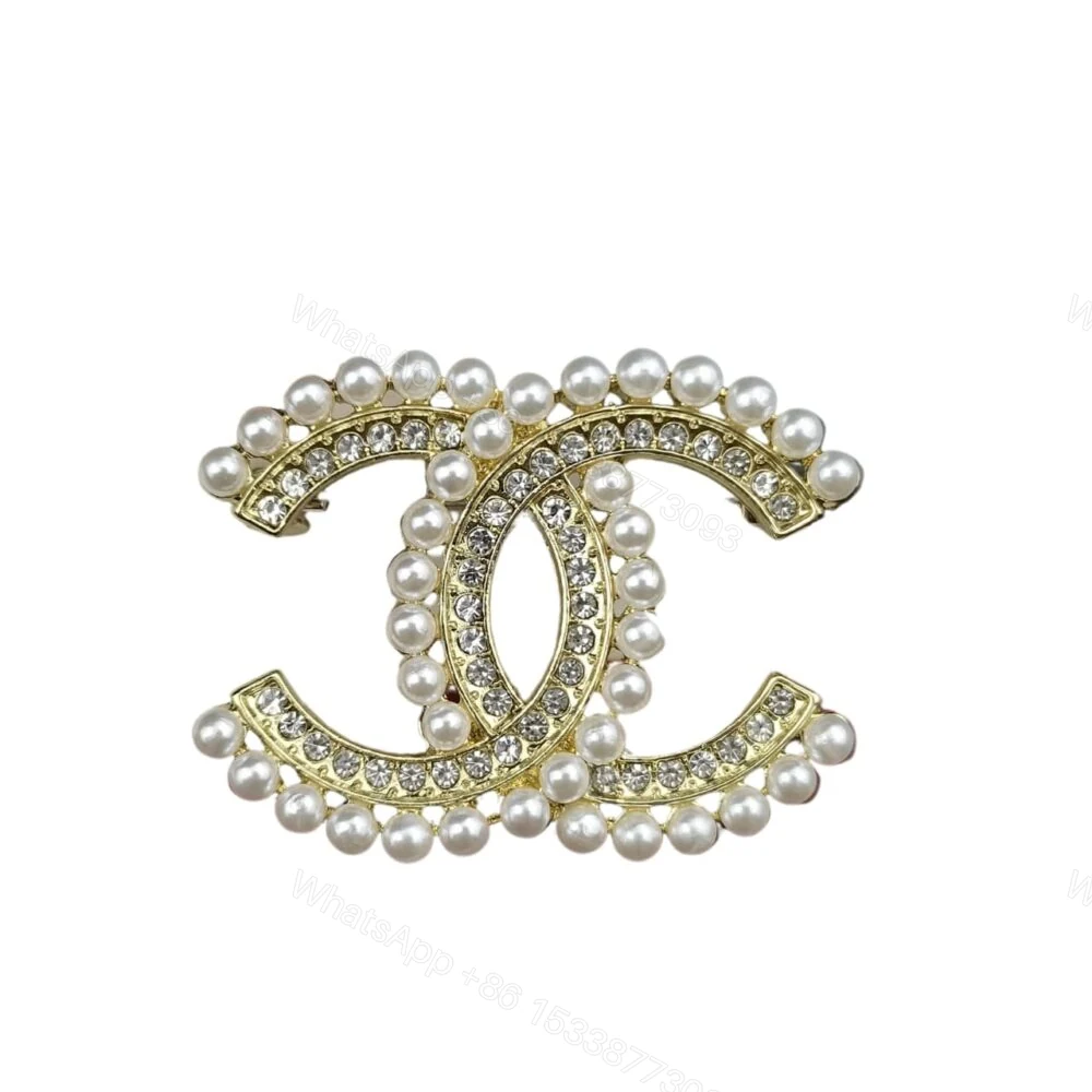 Chanel Cc Brooch Gold With Stones Attached And Pearls — view 1
