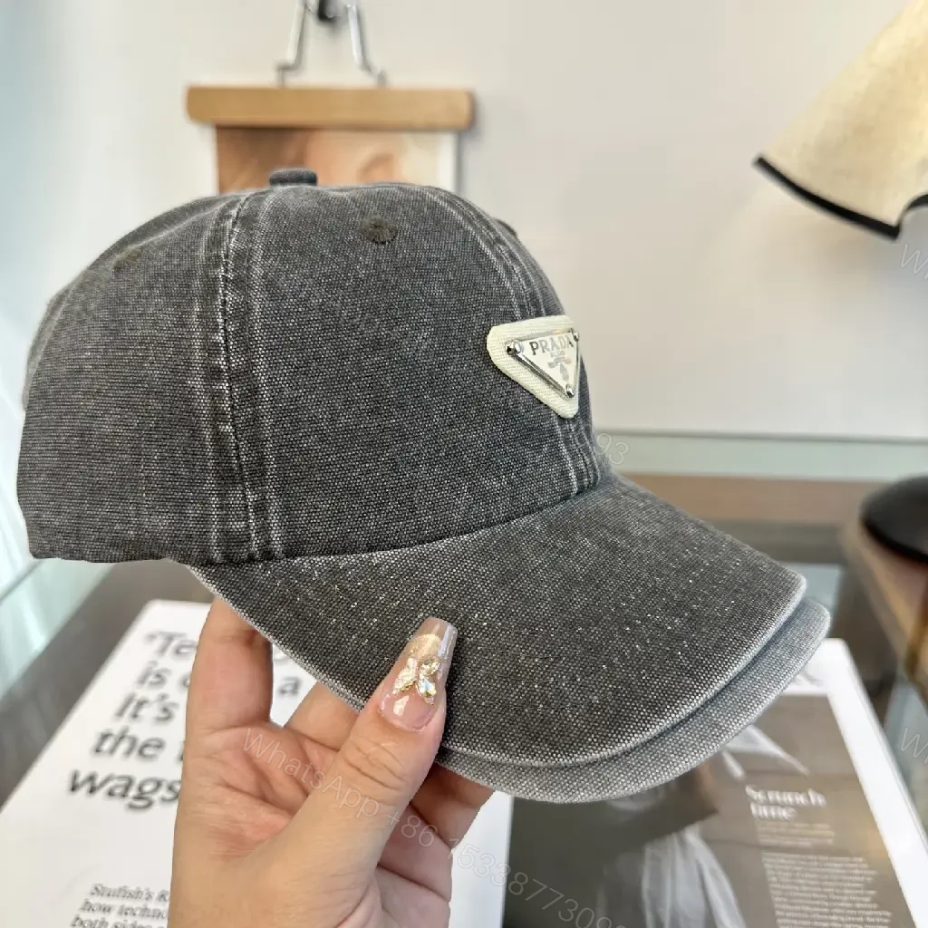 View 4 of Washed Dark Gray Denim Cap, Curved Brim, Distressed Texture, Prada Patch