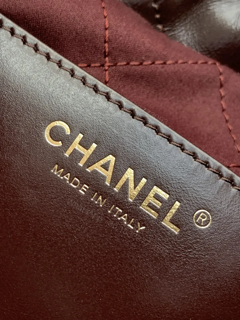 View 7 of Gold-Traced Quilted Bucket Bag: Luxury Leather, Iconic Hardware