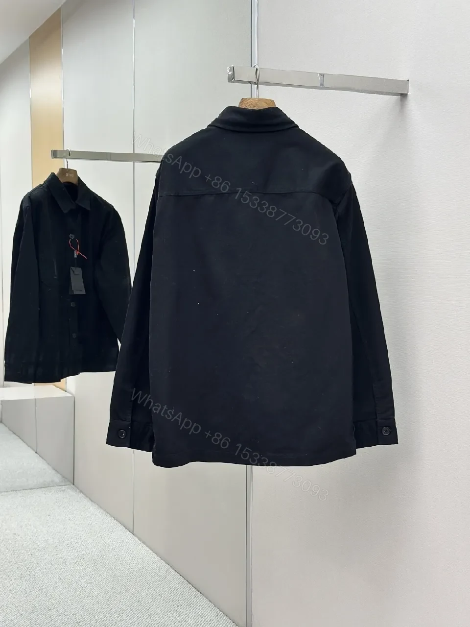View 3 of Black Cotton-Blend Minimalist Shirt Jacket with Subtle Embroidery
