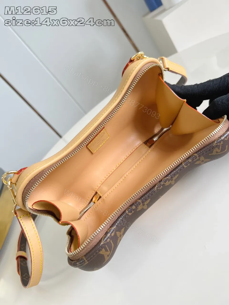 View 5 of Monogram Canvas Bone Bag: Luxe Everyday Chic