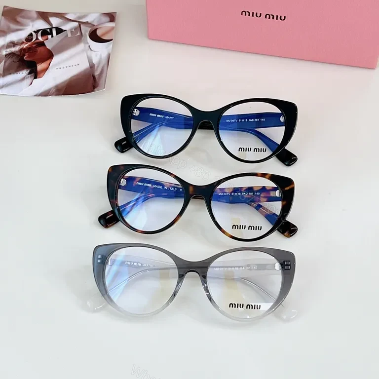 View 7 of Miu Miu Black Cat-Eye Eyewear: Everyday Luxury