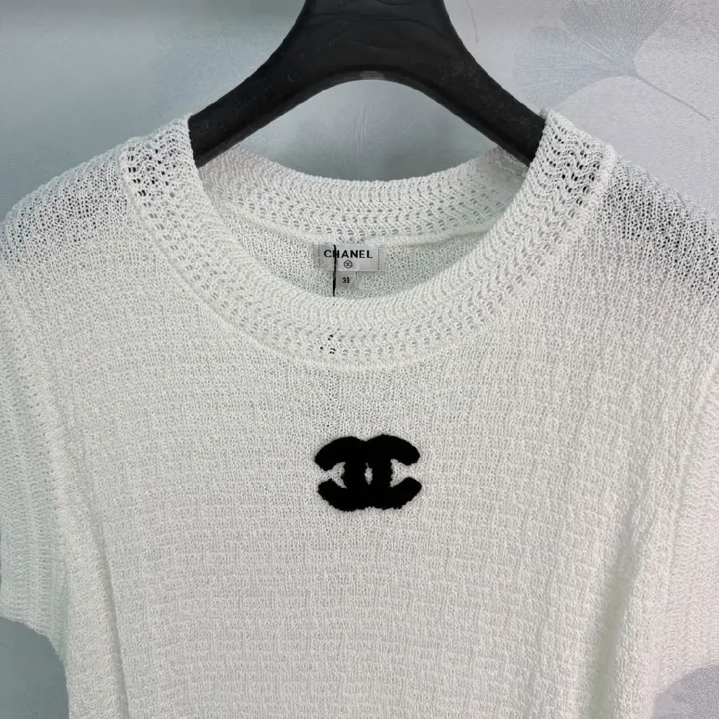 View 10 of White boucle knit relaxed-fit sweater with Chanel logo