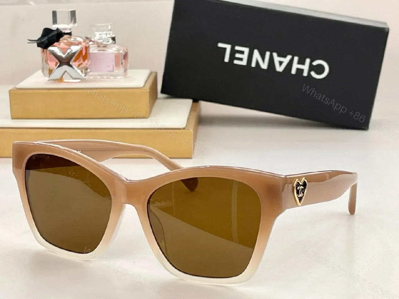 View 3 of Black Cat-Eye Sunglasses with Gold Heart Detail - Premium Acetate