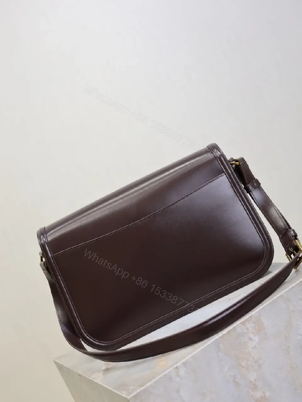 View 7 of Chic Leather Crossbody with Gold-Tone Hardware, Compact Carry