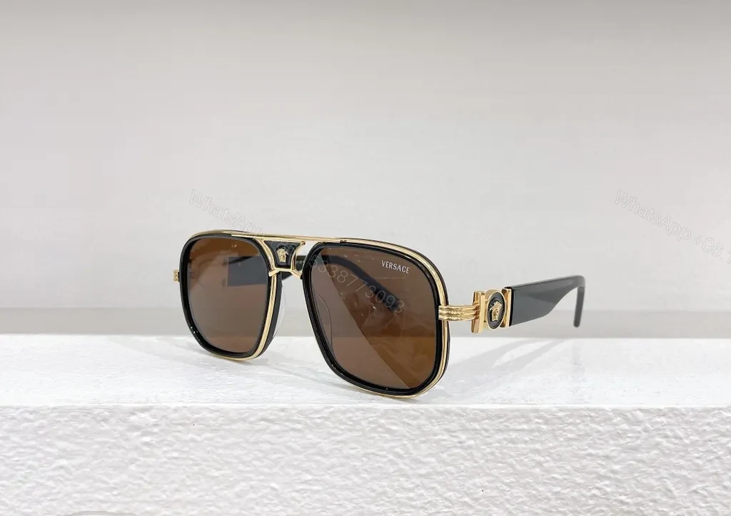 View 4 of Gold-Tone Frame Designer Sunglasses with UV400 Protection - Unisex