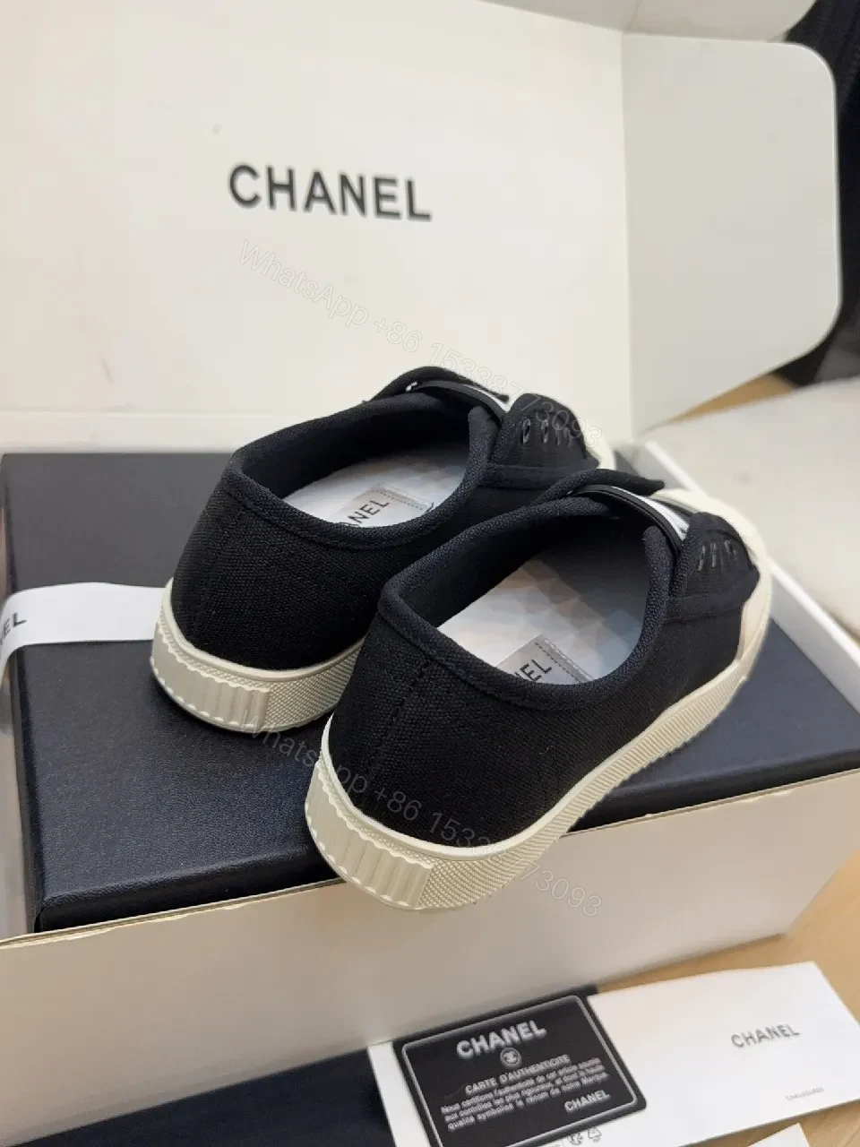 View 9 of Minimalist Black Canvas Sneakers with Logo Strap
