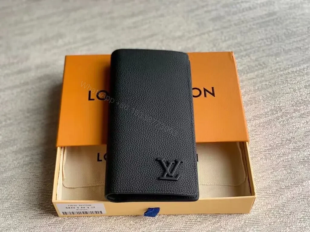 View 2 of Pristine Black Leather Wallet â€” Subtle LV Emblem, Organized