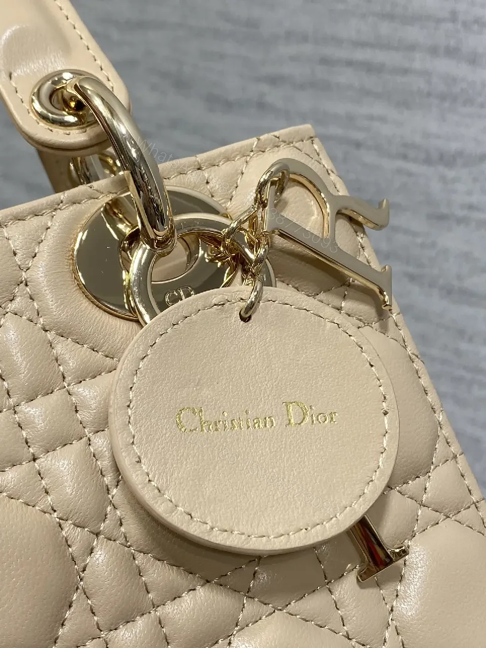 View 7 of Beige Quilted Leather Handbag with Top Handle for Everyday Luxury
