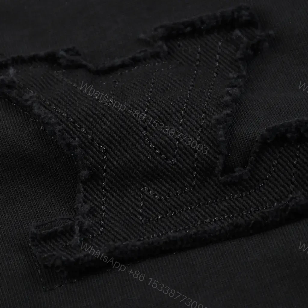 View 8 of Black Cotton-Blend Crewneck Tee: Subtle LV Embroidery, Luxury Comfort