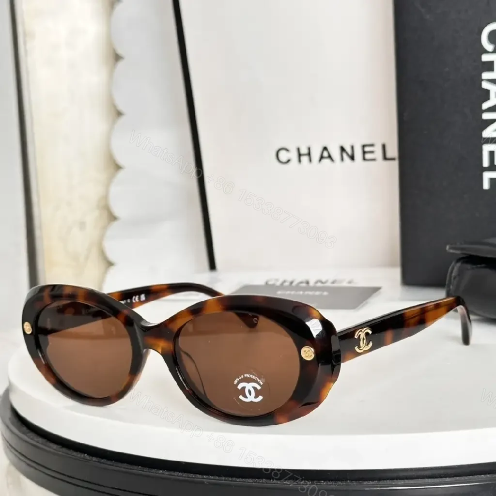 View 9 of Lux Black Round Sunglasses with Gold Hardware, Oversized UV Protection