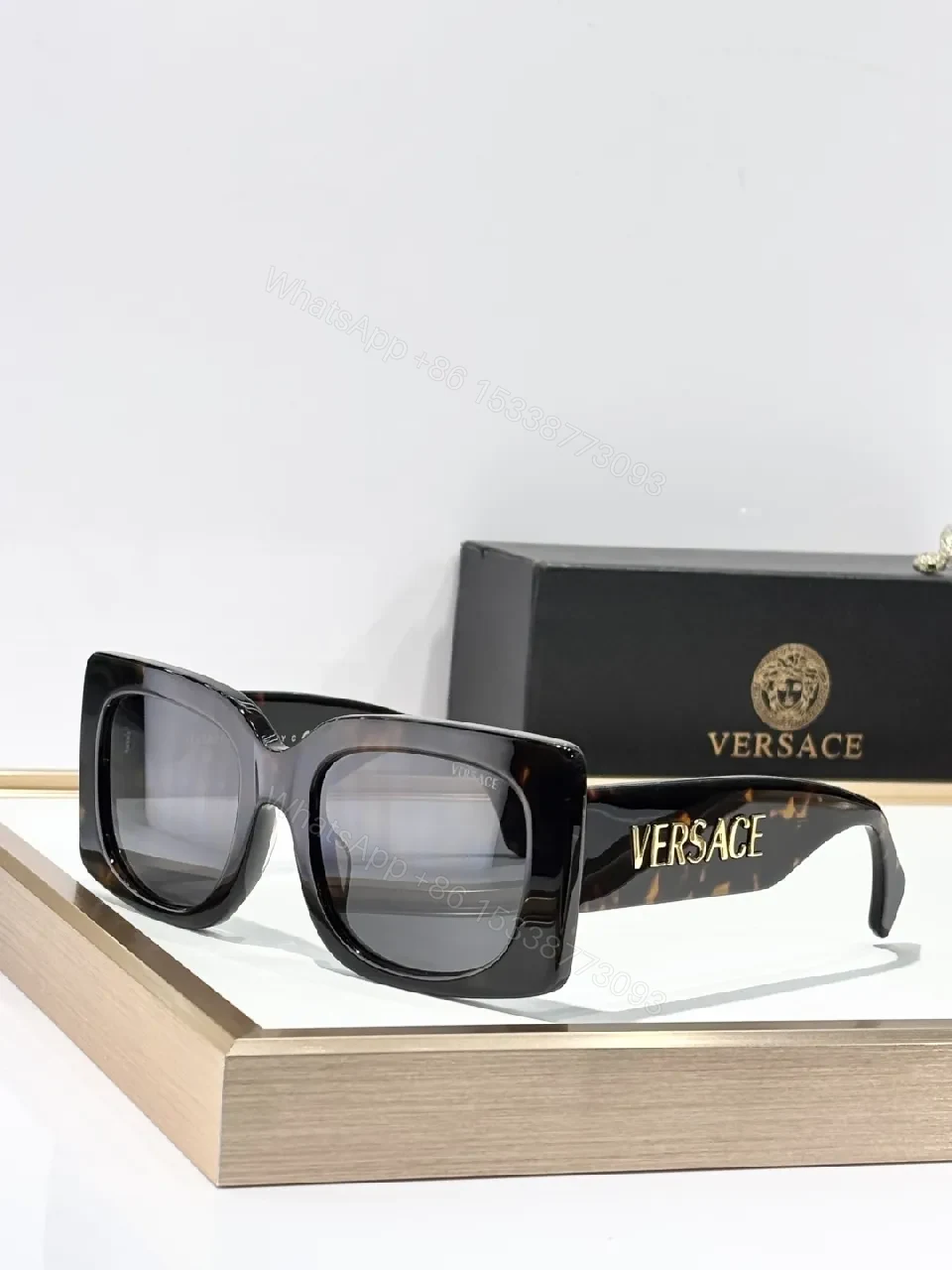 View 5 of Bold Black Statement Sunglasses with Logo-Injected Glamour