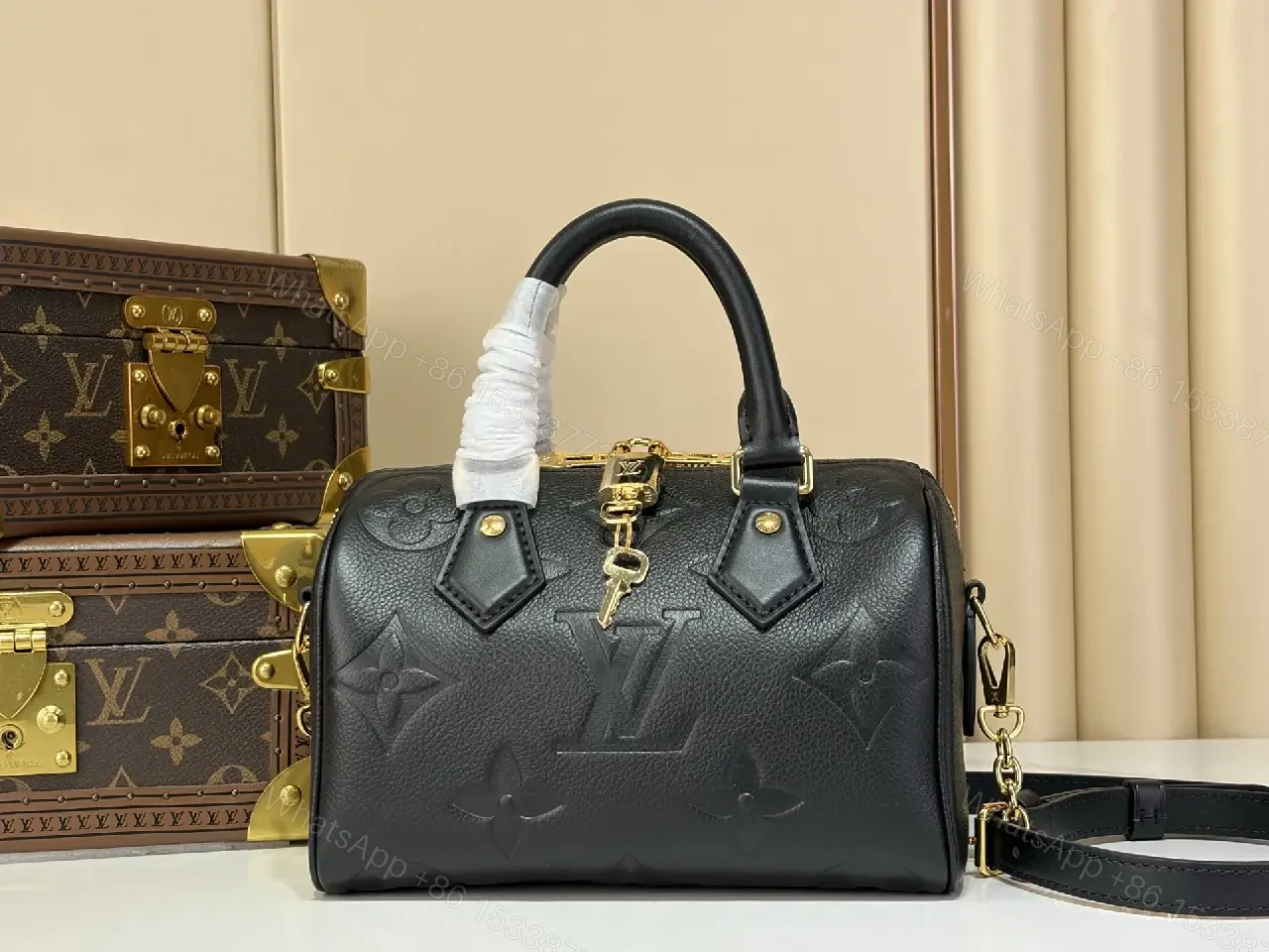 View 8 of Black Pebbled Leather Dome Handbag with Gold Details