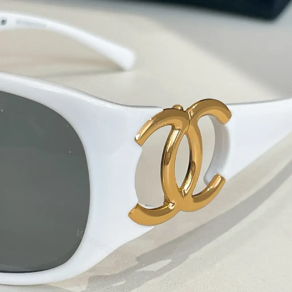 View 4 of Oversized Black Luxury Sunglasses with Gold Logo Details