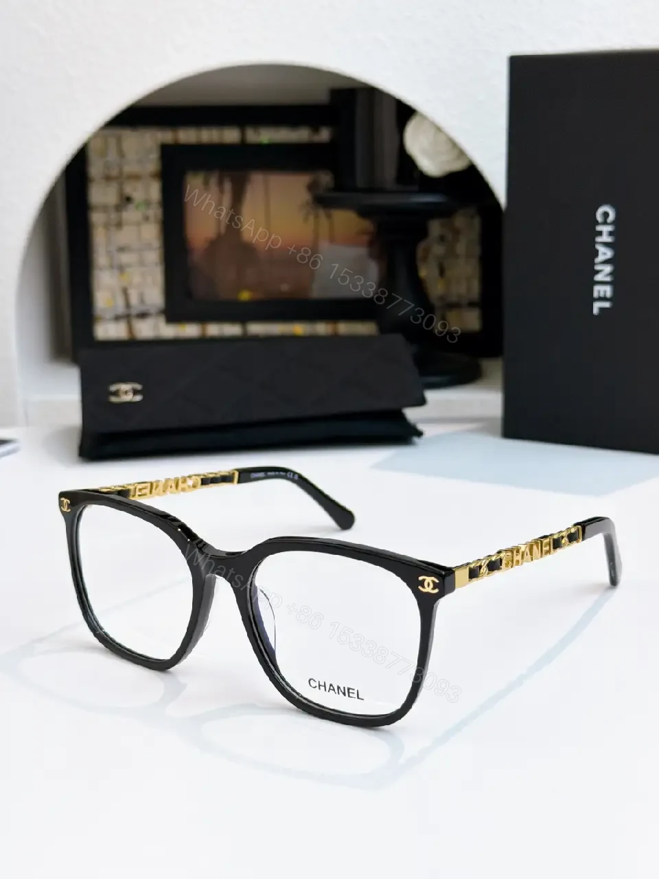 View 4 of Clear Translucent Frame Modern Oversized Sunglasses with CHANEL Accents