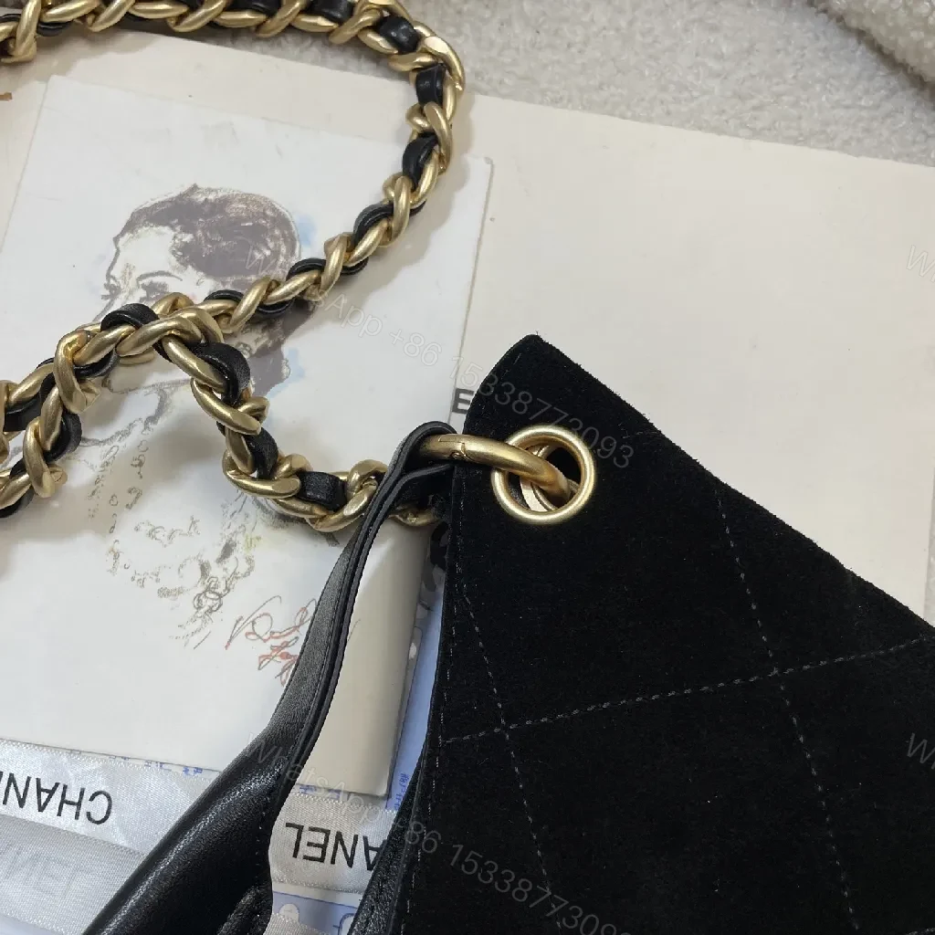 View 8 of Quilted Black Bag with Gold Chain, Top Handle, Compact