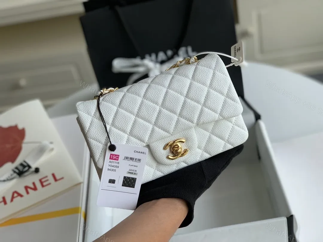 View 5 of Ivory Quilted Leather Mini Flap Bag - Elegant Everyday Luxury