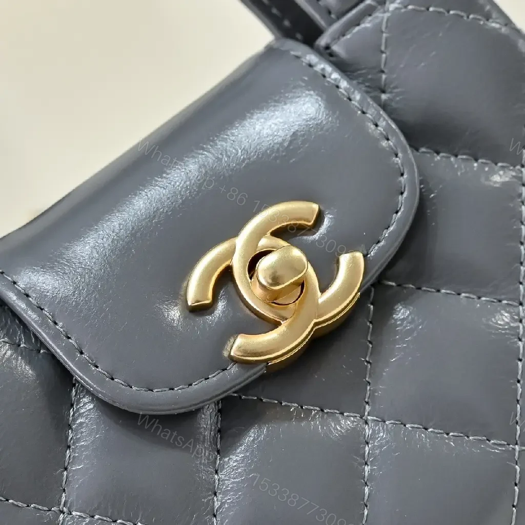 View 7 of Quilted Leather Mini Bag with Gold Turn-Lock, Compact Style