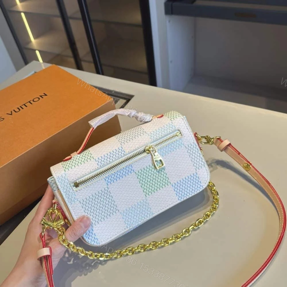 View 4 of Louis Vuitton Pochette Métis East West Damier Light Blue 21Cm N40749