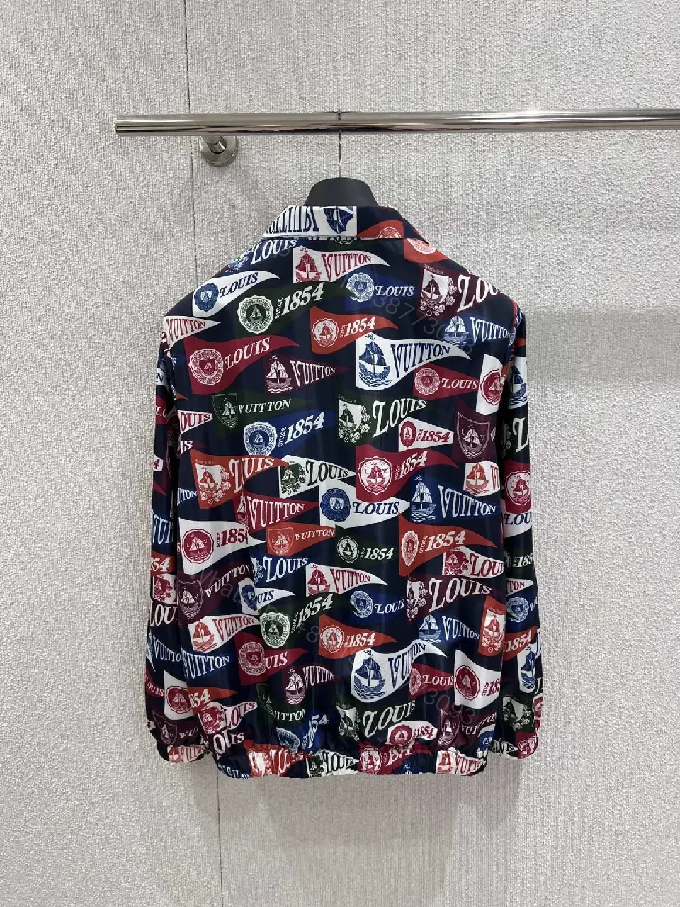 View 7 of Bold Patterned Zip Jacket: Logo Motif Luxury Streetwear