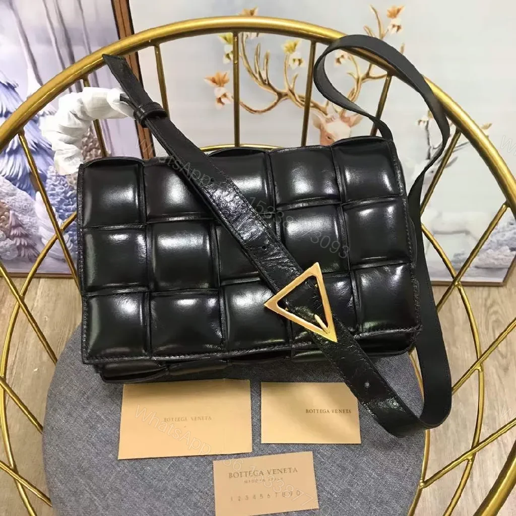 View 3 of Black Leather Grid Bag: Structured Chic Crossbody with Gold Triangle Hardware