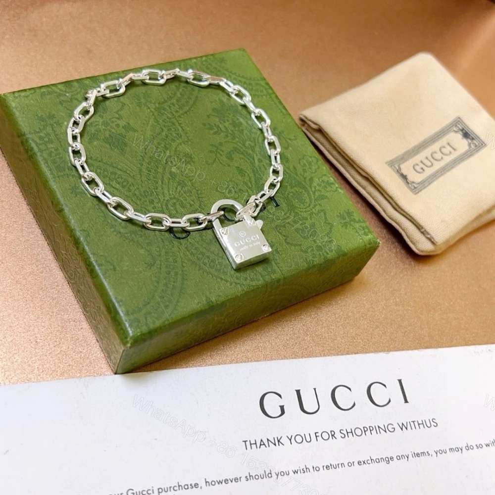 View 2 of GUCCI TRADEMARK SILVER CHAIN ​​BRACELET WITH PADLOCK