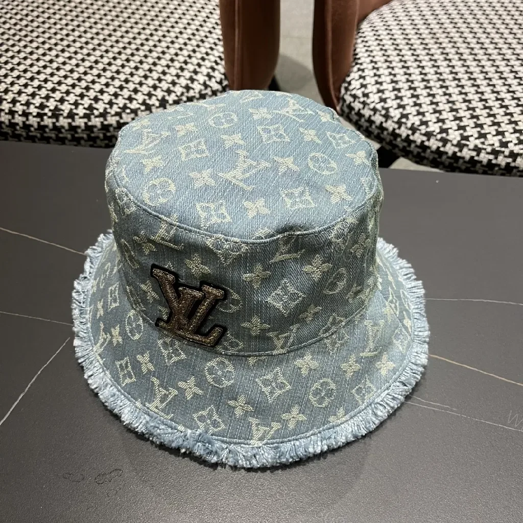 View 3 of Denim-Print Bucket Hat with LV Accent, Luxe Casual Accessory