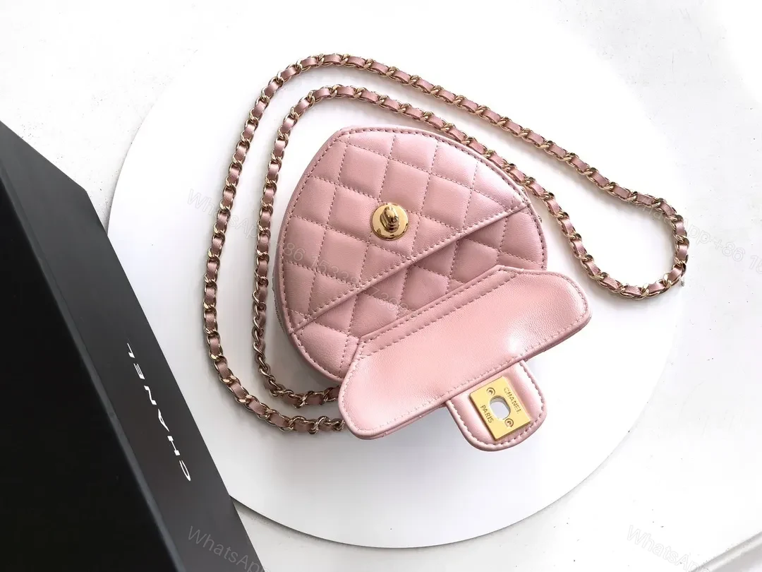 View 6 of Soft Pink Quilted Heart Mini Bag with Gold Logo Bag