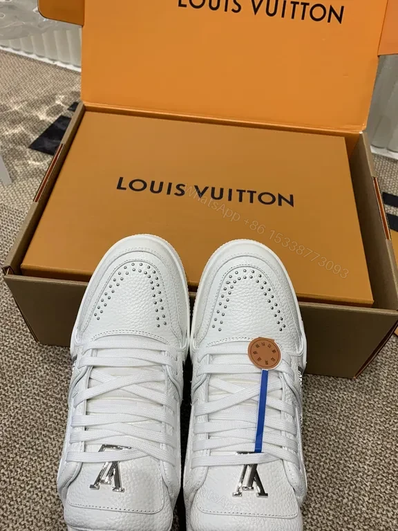 View 2 of White Leather Sneakers: Signature LV Detailing, Everyday Luxury