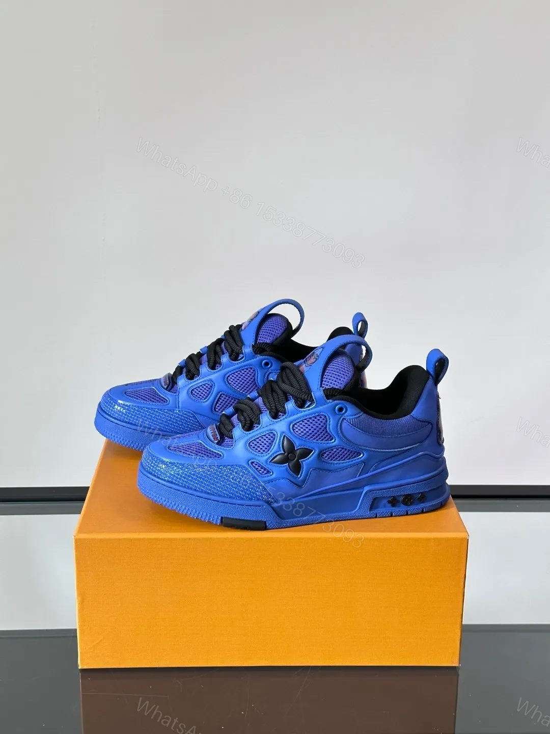 View 3 of LV Men Blue Mesh And Leather Sneakers