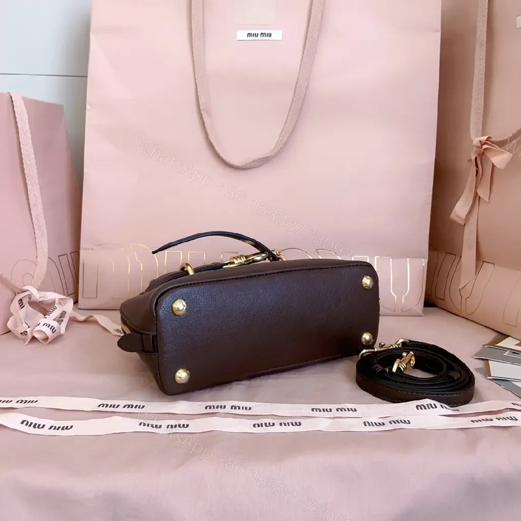View 7 of Compact Pebbled Leather Satchel with Gold Hardware
