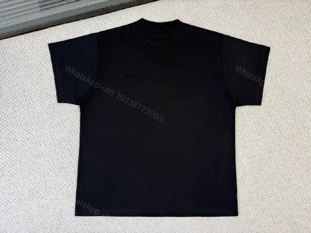 View 4 of Black Cotton Blend Relaxed Tee with Avant-Garde Graphic Edge